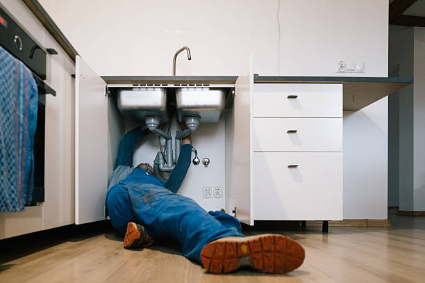 Professional Drain Cleaning technician working in Roosevelt, NJ